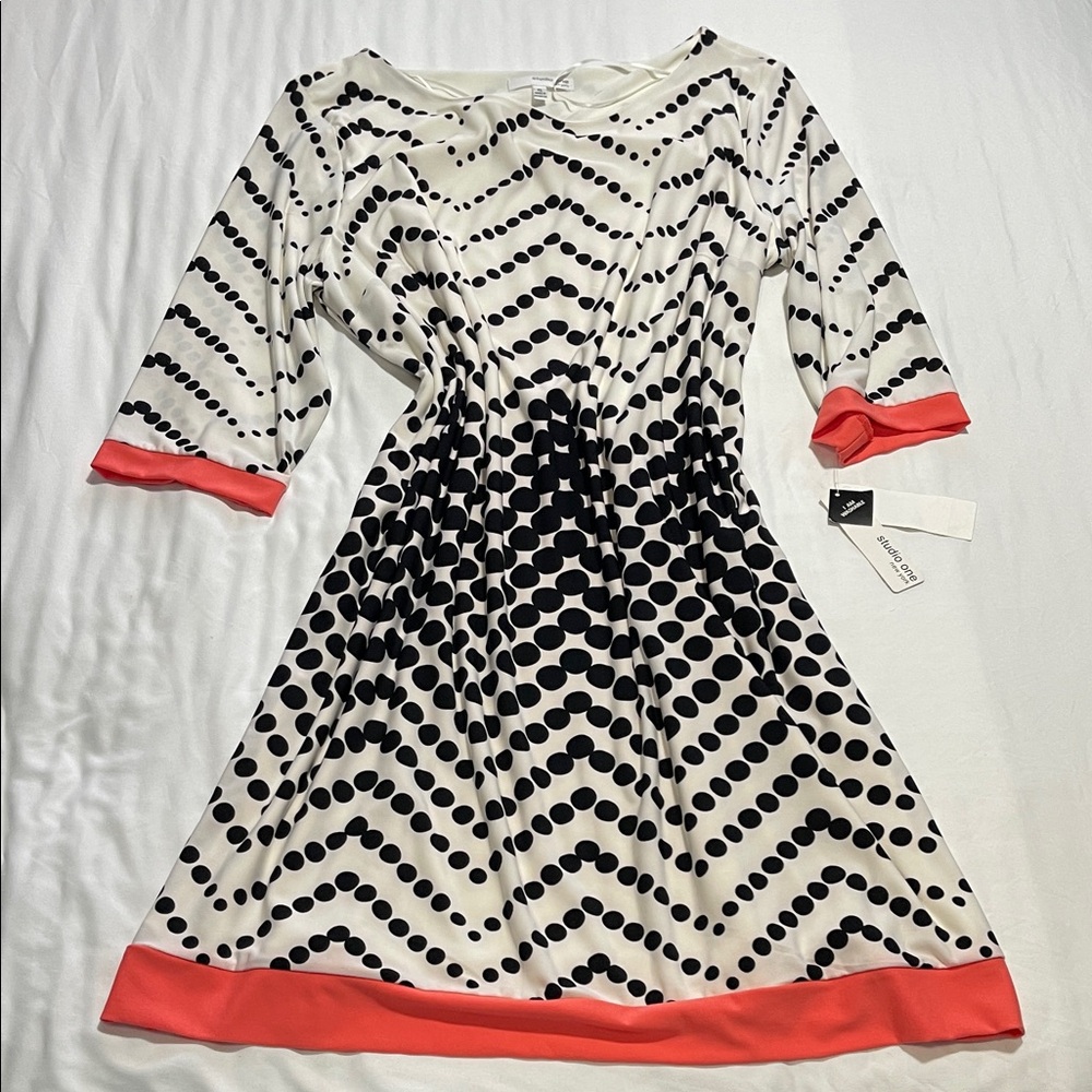 Elegant Black and White Polka Dot Dress with Coral Trim